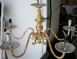 Chandelier with sand applied on it